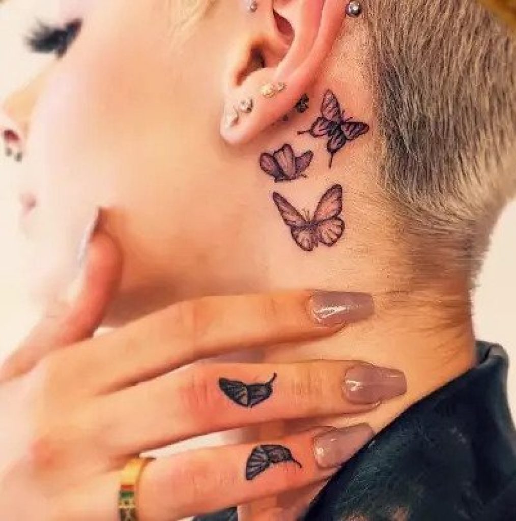 butterfly neck tattoo