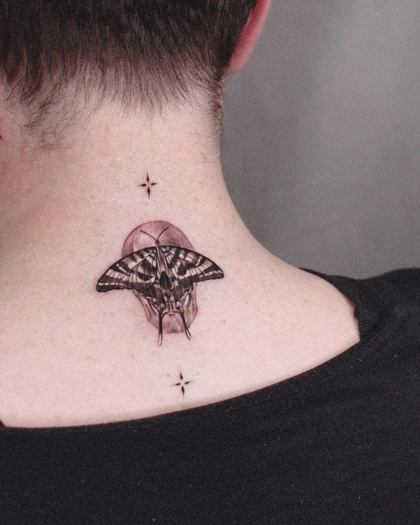 butterfly neck tattoo