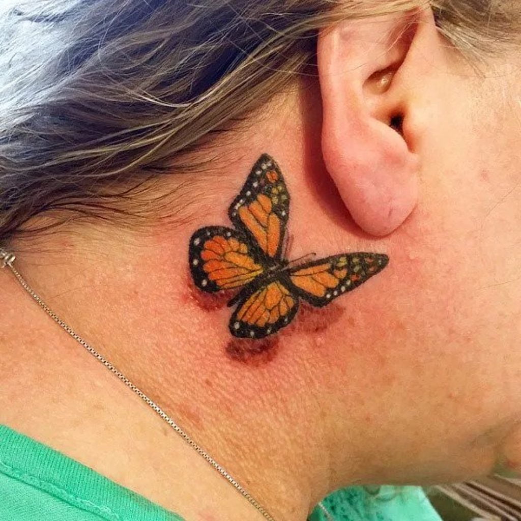 butterfly neck tattoo